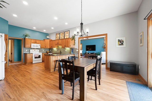 16619 Amethyst Pkwy, Fort Wayne, IN 46845 - dining area featuring a chandelier, light wood-style flooring, and recessed lighting