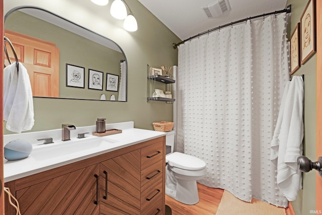 16619 Amethyst Pkwy, Fort Wayne, IN 46845 - bathroom with vanity, wood finished floors, and a shower with shower curtain