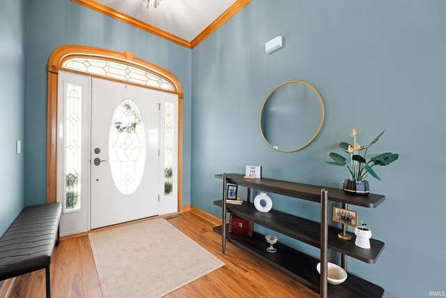 16619 Amethyst Pkwy, Fort Wayne, IN 46845 - entryway featuring wood finished floors and crown molding
