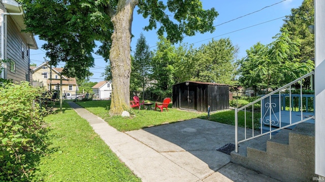 1607 Franklin Ave, Fort Wayne, IN 46808 - view of yard featuring a shed and a patio