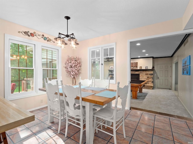 8220 Sakaden Pkwy, Fort Wayne, IN 46825 - dining room featuring light colored carpet, a chandelier, and recessed lighting