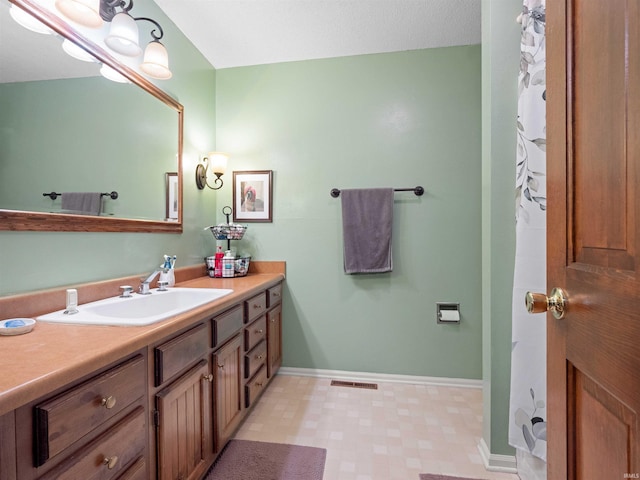 8220 Sakaden Pkwy, Fort Wayne, IN 46825 - bathroom featuring vanity and tile patterned floors