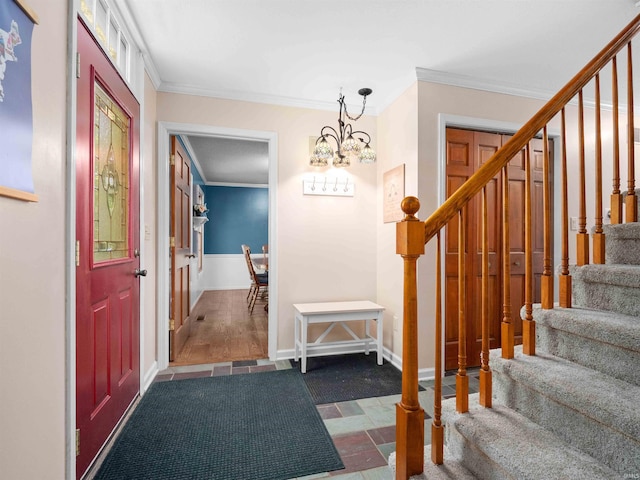 8220 Sakaden Pkwy, Fort Wayne, IN 46825 - entrance foyer with stairs, ornamental molding, and a chandelier