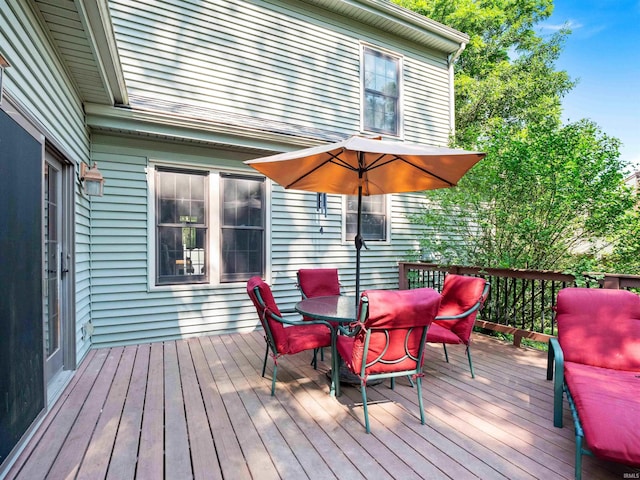 8220 Sakaden Pkwy, Fort Wayne, IN 46825 - wooden deck with outdoor dining area
