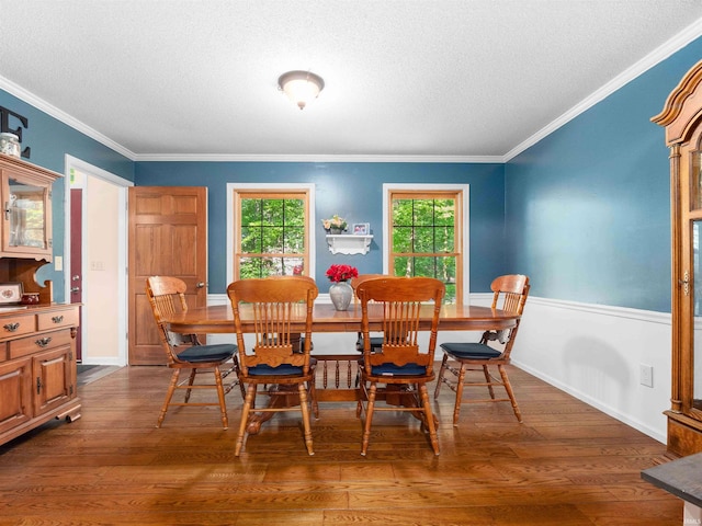8220 Sakaden Pkwy, Fort Wayne, IN 46825 - dining room with a textured ceiling, dark wood-type flooring, and crown molding