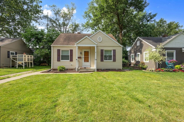 1738 Sunnymede Ave, South Bend, IN 46615 - bungalow-style home featuring a front lawn, a chimney, and a shingled roof