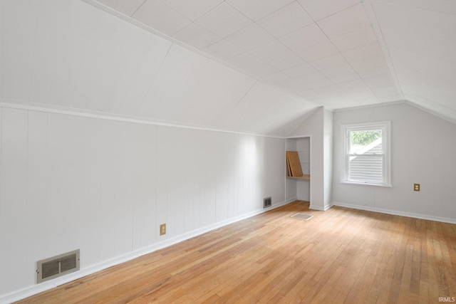 1738 Sunnymede Ave, South Bend, IN 46615 - bonus room with light wood-style flooring and vaulted ceiling