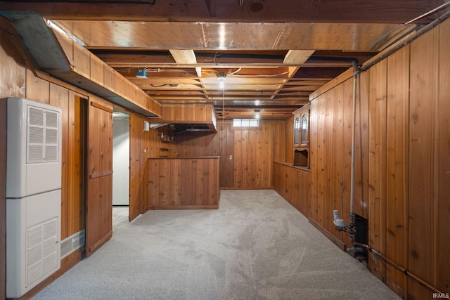 1738 Sunnymede Ave, South Bend, IN 46615 - finished below grade area with a heating unit, carpet flooring, and wooden walls
