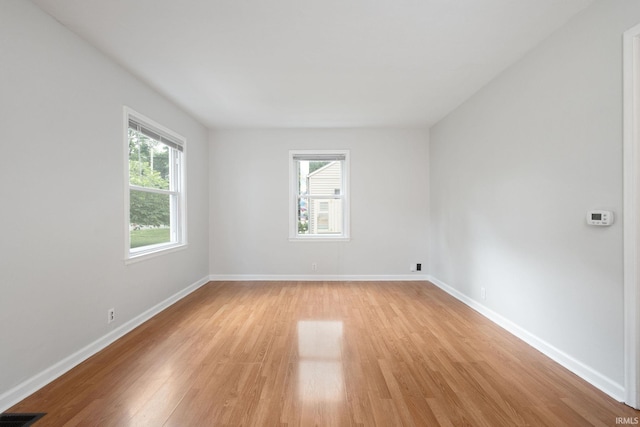 1738 Sunnymede Ave, South Bend, IN 46615 - spare room featuring healthy amount of natural light and light wood-style flooring