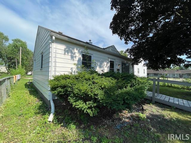 106 N Wellington St, South Bend, IN 46619 - view of home's exterior with a wooden deck