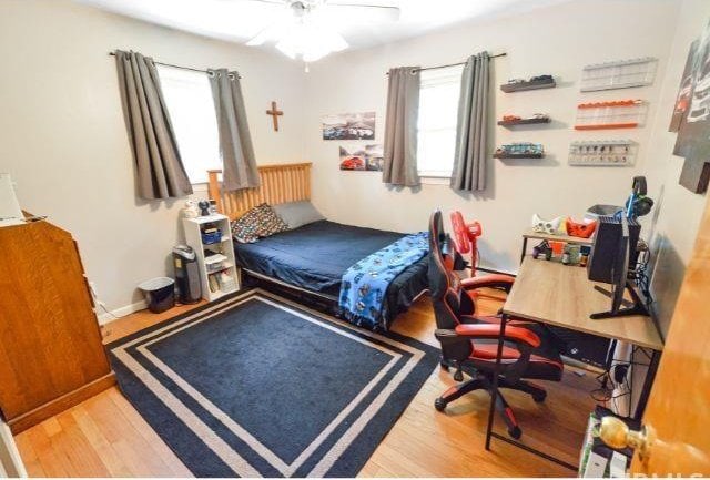 7132 W 350 N, West Lafayette, IN 47906 - bedroom with wood finished floors and ceiling fan