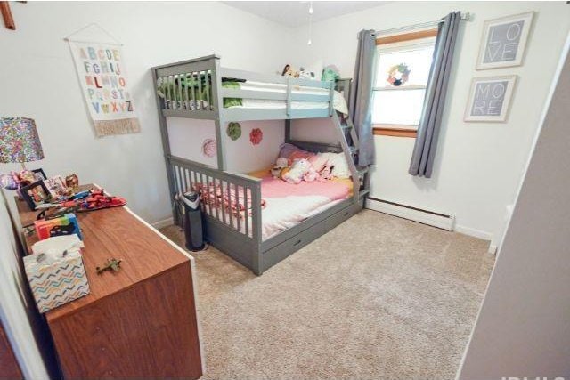 7132 W 350 N, West Lafayette, IN 47906 - carpeted bedroom featuring a baseboard radiator and baseboards