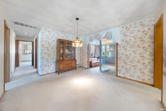 1202 Park Ave, New Haven, IN 46774 - unfurnished dining area with wallpapered walls, light carpet, and healthy amount of natural light