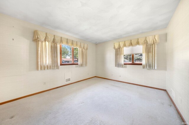 1202 Park Ave, New Haven, IN 46774 - carpeted empty room featuring baseboards