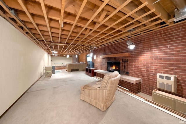 1202 Park Ave, New Haven, IN 46774 - basement with a fireplace and brick wall