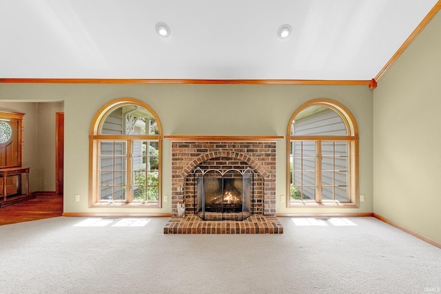 1102 Cabriolet Blvd, Auburn, IN 46706 - unfurnished living room with carpet flooring, ornamental molding, and a fireplace