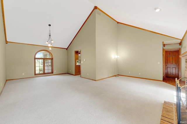 1102 Cabriolet Blvd, Auburn, IN 46706 - unfurnished living room with light carpet, high vaulted ceiling, and crown molding