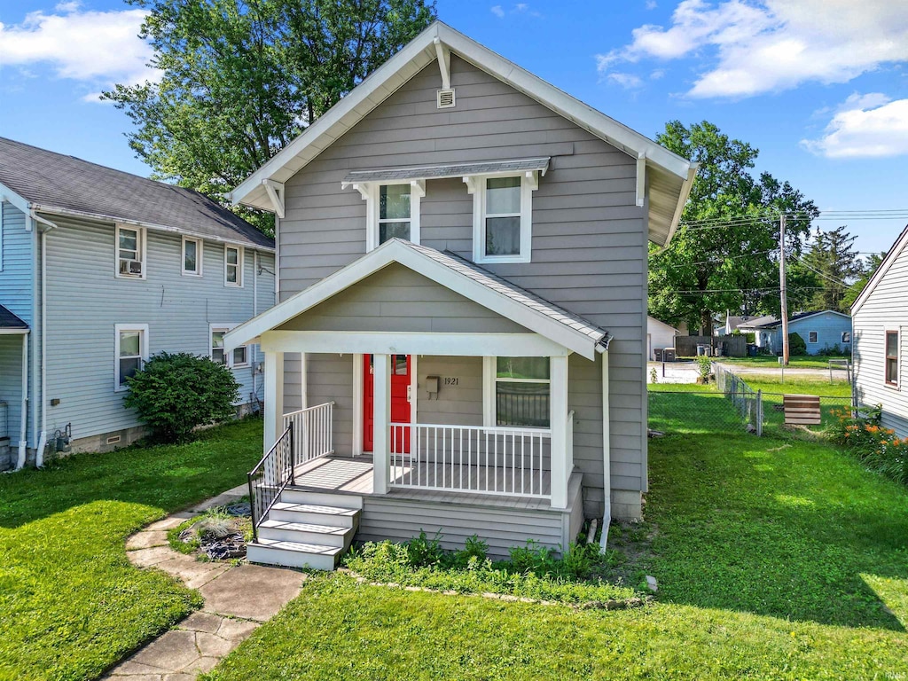 1921 Spring St, Fort Wayne, IN 46808 - american foursquare style home featuring covered porch and a front lawn