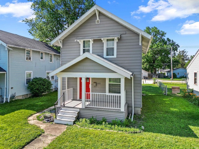 1921 Spring St, Fort Wayne, IN 46808 - american foursquare style home featuring covered porch and a front lawn