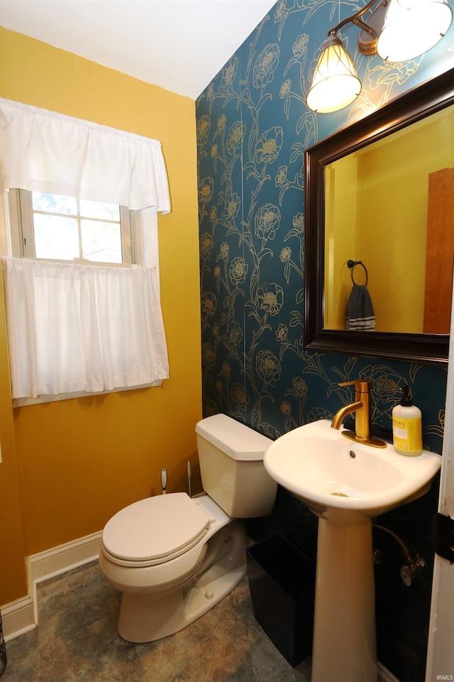 1015 W Battell St, South Bend, IN 46545 - bathroom with wallpapered walls and toilet