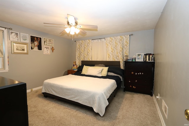 1015 W Battell St, South Bend, IN 46545 - bedroom featuring light colored carpet and ceiling fan