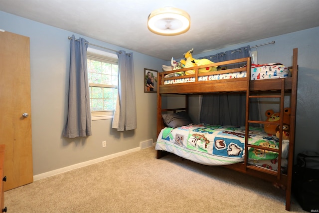 1015 W Battell St, South Bend, IN 46545 - carpeted bedroom featuring baseboards