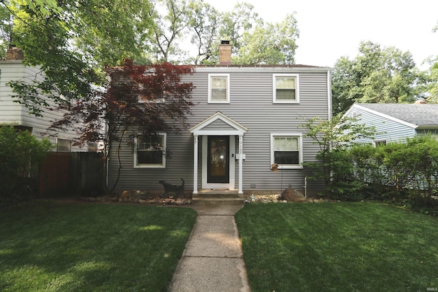 1015 W Battell St, South Bend, IN 46545 - view of front facade featuring a chimney