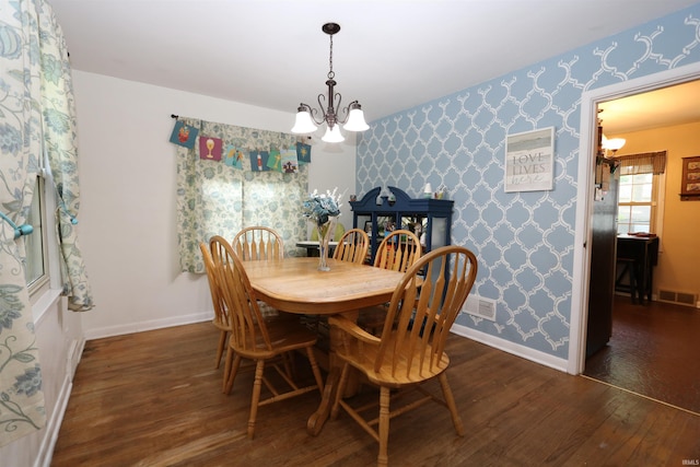 1015 W Battell St, South Bend, IN 46545 - dining area with a chandelier, hardwood / wood-style flooring, and wallpapered walls