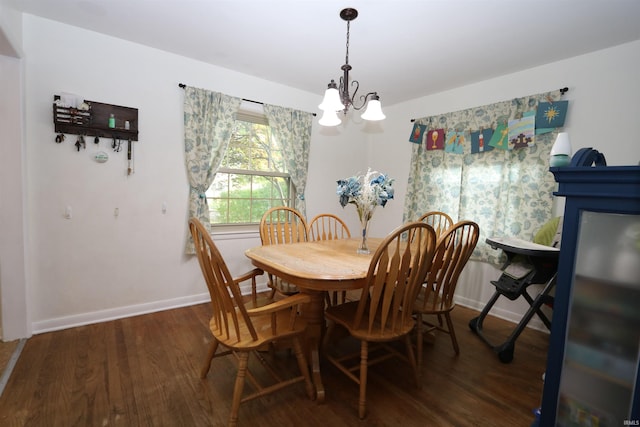 1015 W Battell St, South Bend, IN 46545 - dining room featuring a chandelier and wood finished floors