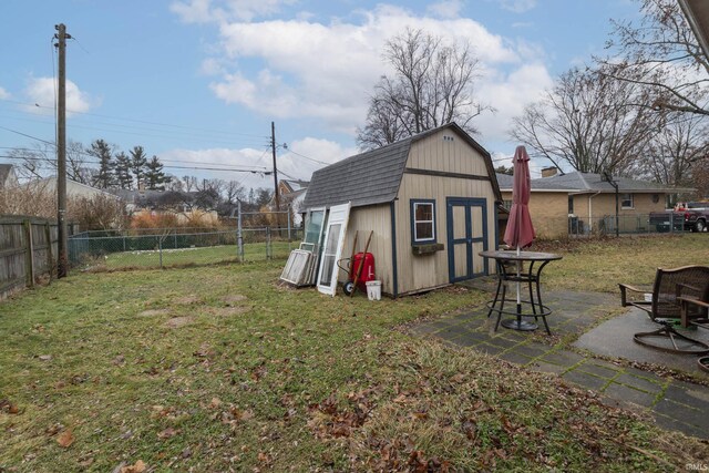 2714 Erskine Blvd, South Bend, IN 46614 - fenced backyard featuring a storage unit and a patio area