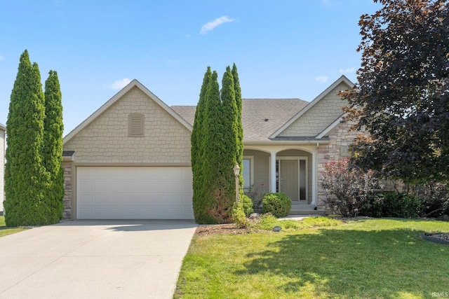 12828 Palazzo Blvd, Fort Wayne, IN 46845 - view of front of home with stone siding, driveway, a garage, a front lawn, and roof with shingles