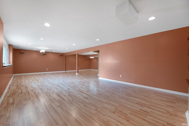 12828 Palazzo Blvd, Fort Wayne, IN 46845 - spare room featuring light wood-type flooring and recessed lighting