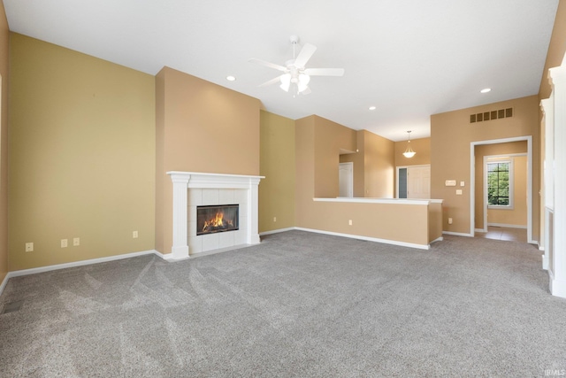 12828 Palazzo Blvd, Fort Wayne, IN 46845 - unfurnished living room featuring ceiling fan, a fireplace, carpet floors, and recessed lighting