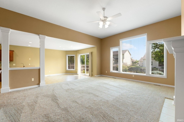 12828 Palazzo Blvd, Fort Wayne, IN 46845 - unfurnished room with decorative columns, a ceiling fan, and light carpet