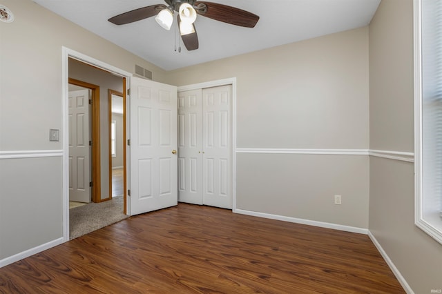 12531 Stoneboro Ct, Fort Wayne, IN 46845 - unfurnished bedroom with wood finished floors, a ceiling fan, and a closet
