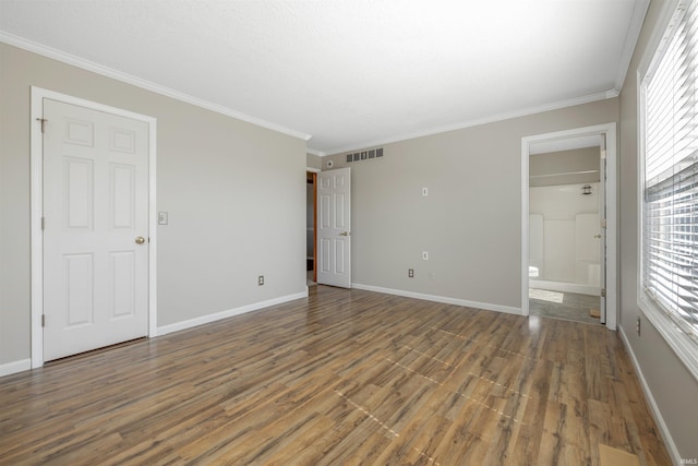 12531 Stoneboro Ct, Fort Wayne, IN 46845 - unfurnished room featuring wood finished floors, healthy amount of natural light, and crown molding