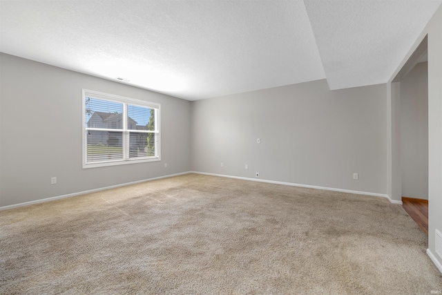 12531 Stoneboro Ct, Fort Wayne, IN 46845 - empty room with light colored carpet and a textured ceiling