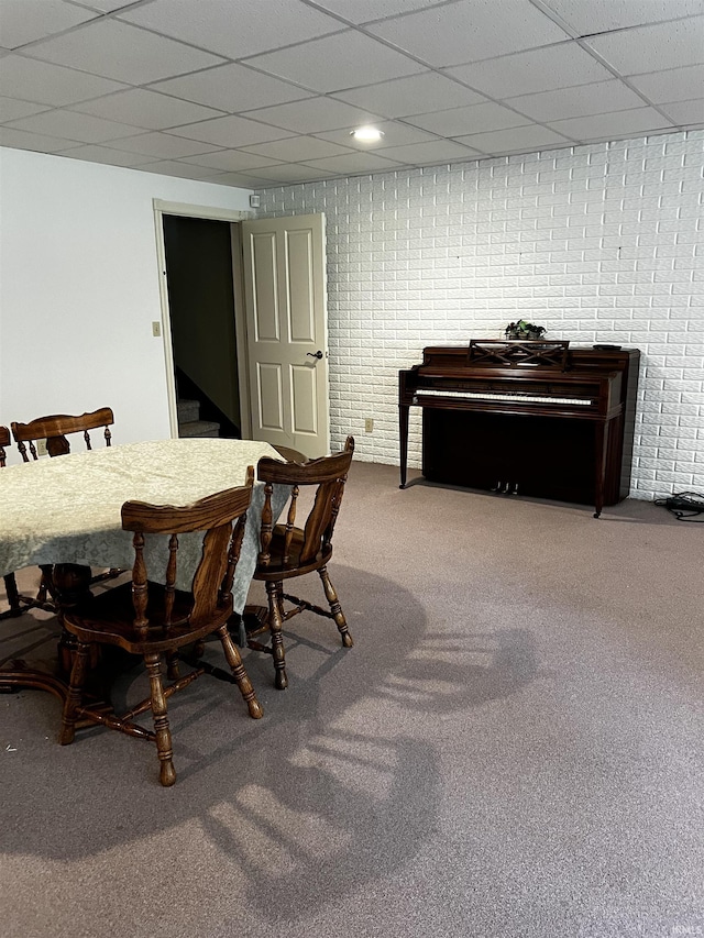 348 N Birdie Ln, Montgomery, IN 47558 - carpeted dining area with a paneled ceiling