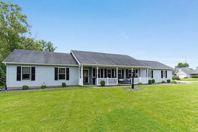 9026 Wallen Ln, Fort Wayne, IN 46825 - ranch-style house featuring covered porch, a front lawn, and a shingled roof