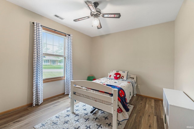 9026 Wallen Ln, Fort Wayne, IN 46825 - bedroom featuring wood finished floors and ceiling fan