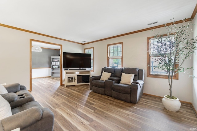 9026 Wallen Ln, Fort Wayne, IN 46825 - living area featuring light wood finished floors and ornamental molding
