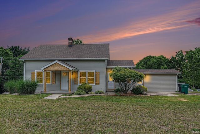 121 W Front St, New Carlisle, IN 46552 - view of front of home with a front yard, a chimney, and a shingled roof