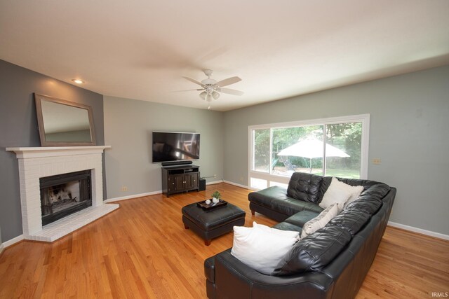 3801 W Capilano Dr, West Lafayette, IN 47906 - living room with ceiling fan, light wood-type flooring, a fireplace, and recessed lighting