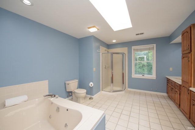 3801 W Capilano Dr, West Lafayette, IN 47906 - bathroom featuring a shower stall, a tub with jets, tile patterned flooring, vanity, and a skylight