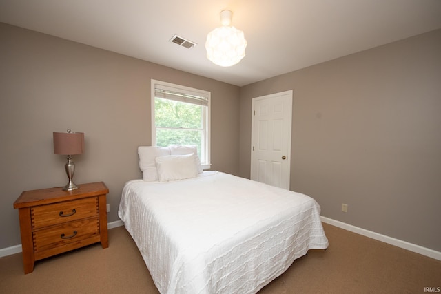 3801 W Capilano Dr, West Lafayette, IN 47906 - bedroom featuring light carpet