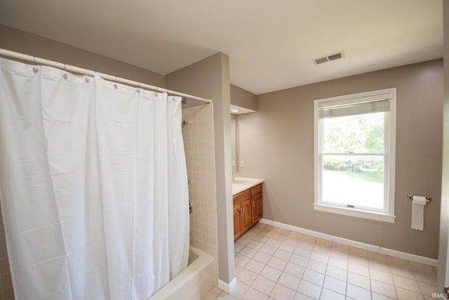 3801 W Capilano Dr, West Lafayette, IN 47906 - bathroom featuring vanity, tile patterned floors, and shower / bath combo