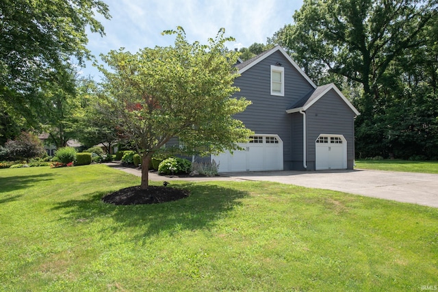 3801 W Capilano Dr, West Lafayette, IN 47906 - view of front of home with a garage, concrete driveway, and a front lawn