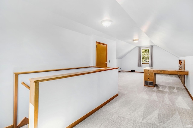 825 W Catalpa Dr, Mishawaka, IN 46545 - additional living space featuring light carpet and vaulted ceiling
