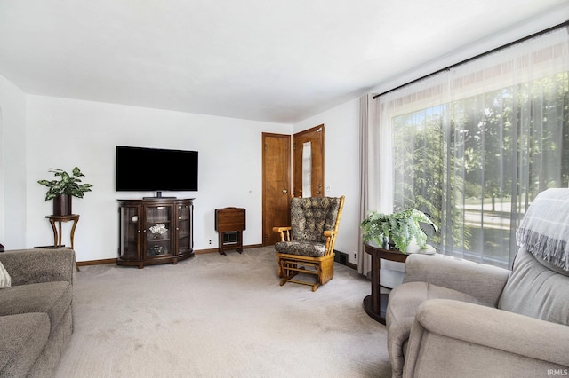 825 W Catalpa Dr, Mishawaka, IN 46545 - carpeted living area featuring baseboards