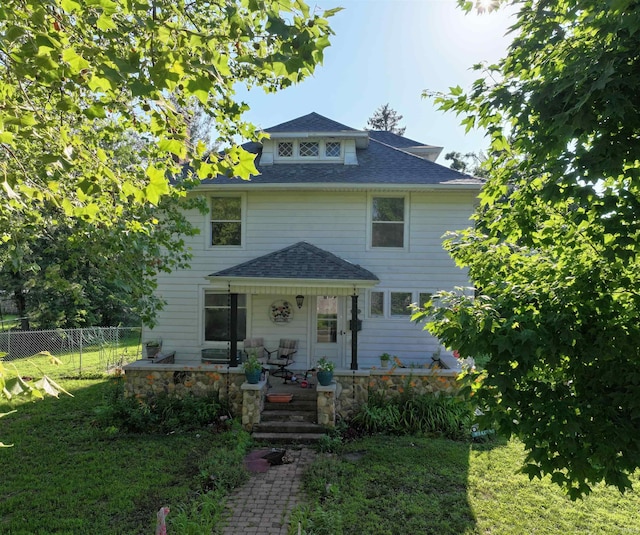 421 S Franklin St, Winamac, IN 46996 - american foursquare style home featuring a shingled roof